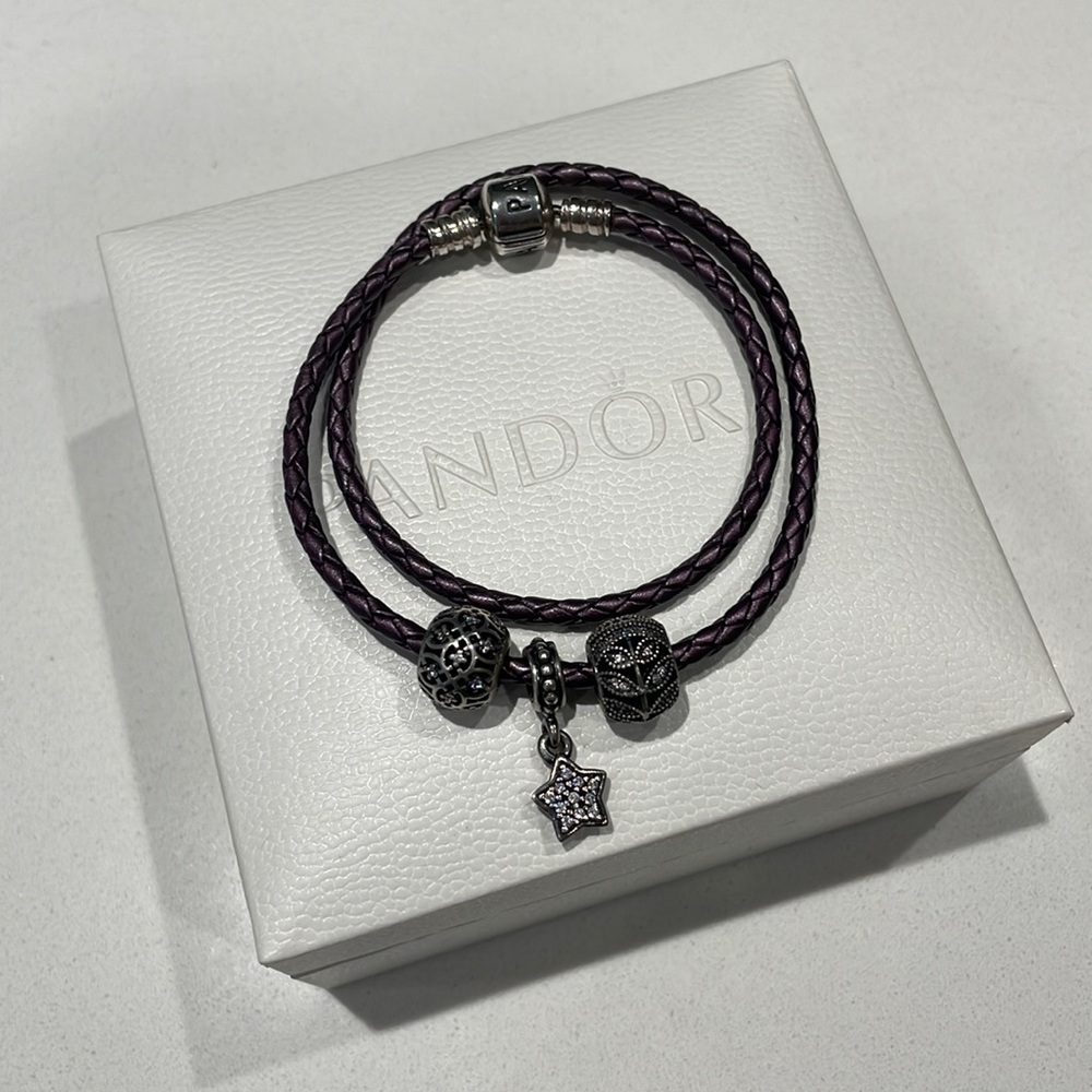 Pandora purple leather bracelet with three crystal charms including star charm
